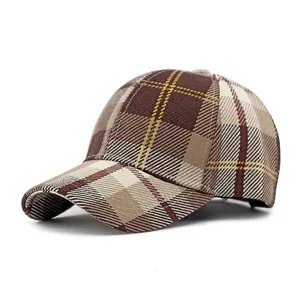 Classic plaid baseball cap in brown and beige check pattern with hard top structured design