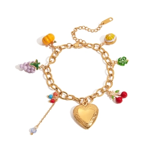 18K gold stainless steel bracelet with colorful fruit charms and heart pendant on white background