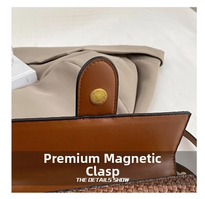 Detail shot of the golden magnetic closure and woven leather texture on a retro crossbody bag