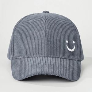 Deep grey corduroy baseball cap with white embroidered smiley face on a high-quality finish