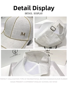 Close-up of white tweed baseball cap showing rhinestone M logo and metal adjustment buckle