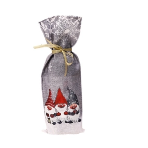 Christmas wine bottle gift bag with printed forest gnomes and golden ribbon decoration