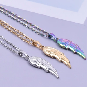 Three 18k gold plated stainless steel angel wing pendant necklaces in gold, silver and rainbow