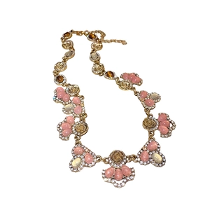 Vintage palace style gold necklace with pink tiger eye stones and floral diamond accents