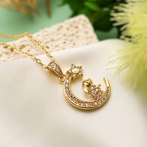 18K gold-plated moon and rabbit necklace with zircon stones on silk fabric