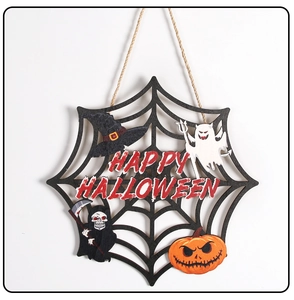 Detail of wooden Halloween spider web door sign with ghost and pumpkin decorations