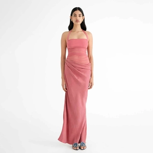 Detailed view of pink halter neck satin dress featuring elegant waist pleats and flowy hem