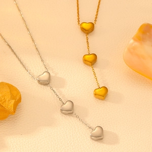 Colliers en acier inoxydable plaqué or 18 carats et argent avec pendentifs cœurs
