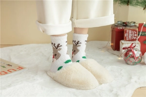Close-up of fluffy reindeer Christmas socks and plush slippers in a festive holiday setting