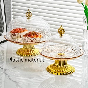 European style golden plastic cake stands with transparent lids in two different sizes