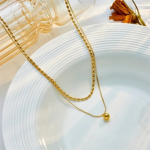 Double layered golden stainless steel beaded chain necklace with round ball pendant