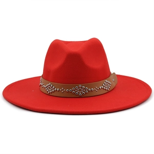 Red wool felt jazz hat with 9.5cm wide brim and studded brown leather decorative band