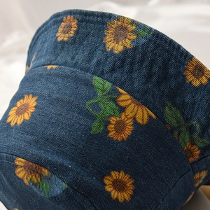 Baby sun hat with yellow sunflower print on denim fabric for boys and girls