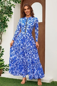 Detail of blue and white floral long-sleeve surf dress with zipper and tiered skirt