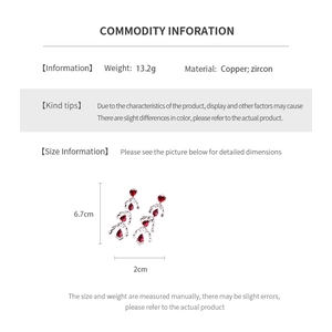 Detailed size and material chart for heart tassel earrings with red zircon accents