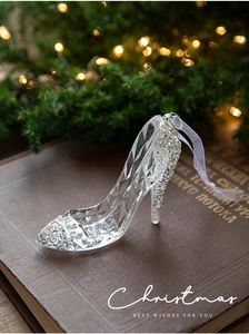 Elegant crystal high heel ornament with silver sparkles and white satin ribbon detail