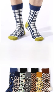 Detail showing various retro plaid and leopard pattern crew socks with soft texture