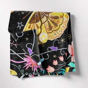 Detail of bohemian tree of life tapestry with butterfly wings and moon floral patterns