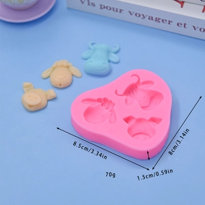 Pink silicone mold with cute sheep, cow, and pig animal head shapes for DIY baking