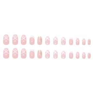 Pink French ballet style press-on nails with white cross straps and subtle glitter