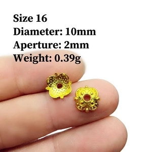 Detail of 10mm gold flower bead caps with frosted texture for DIY jewelry making