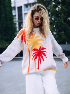Oversized knitted sweater with vibrant palm tree jacquard pattern in cream and orange