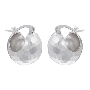 Detailed close-up of silver hammered metal hoop earrings with hollow spherical texture