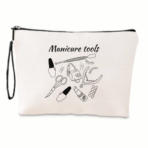 Detail of white canvas manicure tool bag featuring black zipper and nail care illustration