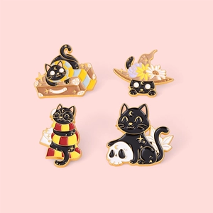 Set of 4 black cat enamel pins featuring wizard and magic themes on a pink background