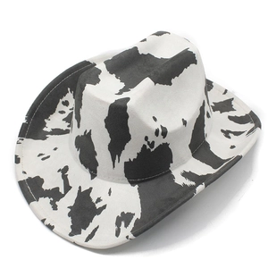 Detailed view of the cow print western cowboy hat with soft faux suede texture