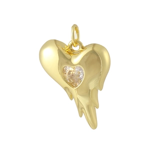 Close-up of 18K gold plated heart pendant with central zircon and melting fluid texture