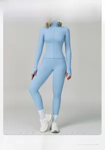 Detail of light blue yoga set featuring thumbhole cuffs and slim fit zipper jacket