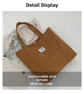 Detail shot of brown corduroy tote bag showing ribbed texture and magnetic closure