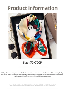 Detail of 70x70cm geometric print silk scarf displayed with stylish fashion accessories