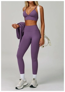 Three-piece seamless yoga set with sports bra high-waist leggings and jacket in dark purple