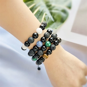 Four-piece set of 10mm natural lava stone and tiger eye beaded bracelets for men and women