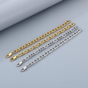 Detail view of 3:1 pattern stainless steel curb chains in gold and silver finishes