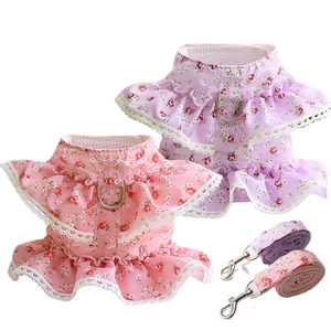 Floral pet harness dress set in pink and purple lace fabric with matching leashes