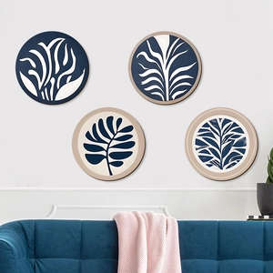 Set de 4 placas de pared redondas de madera bohemia con estampados botánicos azules