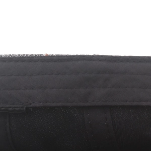 Detailed close-up of inner sweatband with reinforced stitching on black cotton ivy cap