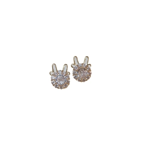 Elegant gold plated rabbit stud earrings with sparkling cubic zirconia stones and white ears