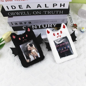 Plush devil-winged photo card holder with cat ears for idol collection display
