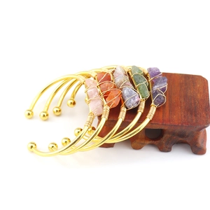 Set of 4 handmade gold-plated bracelets with raw amethyst and natural crystal stones