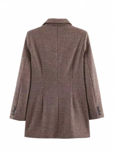 Detail view of houndstooth plaid blazer back with slit and decorative sleeve buttons