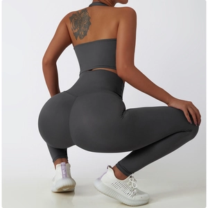 Detail of high-waist yoga leggings and backless crop top with squat-proof charcoal fabric