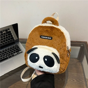 Detail of cute panda plush backpack featuring fuzzy material and side zipper compartment
