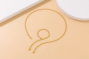 Detail of trendy gold titanium steel chain necklace and bracelet set with lobster clasps