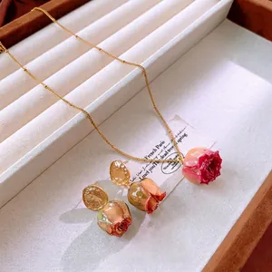 Titanium steel jewelry set with red preserved rose pendant and matching earrings