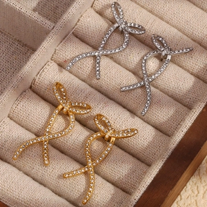 Sparkling 18K gold and silver plated butterfly stud earrings with micro-set rhinestones