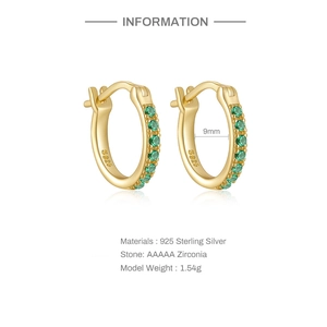 Detail showing 9mm gold plated S925 silver hoop earrings with green zircon stones